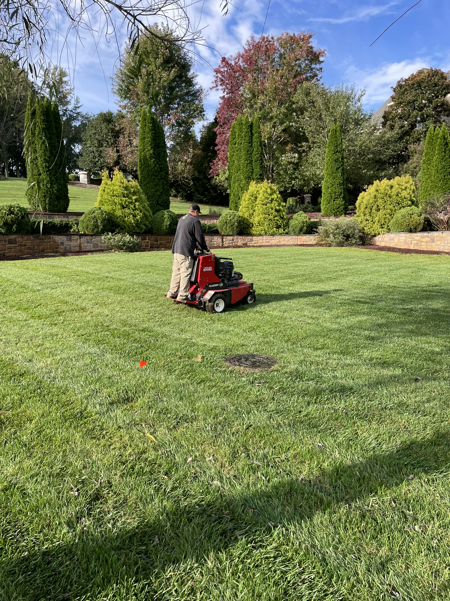 Weston's crew maintaining a commercial lawn